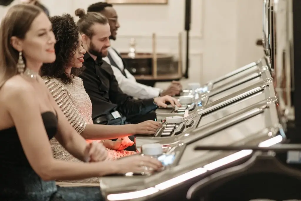 People playing slot machines